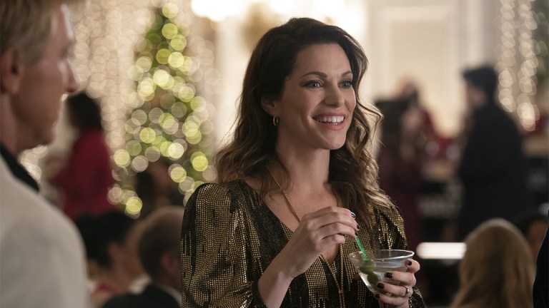 Courtney Henggeler with a martini as Amanda LaRusso in Cobra Kai