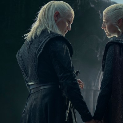 Daemon (Matt Smith) and Rhaenyra (Emma D'Arcy) hold hands in House of the Dragon season 2 episode 8.