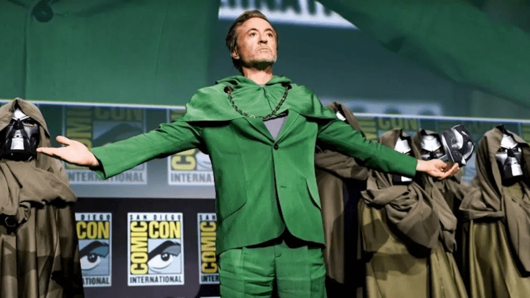 Robert Downey Jr. in green suit on stage